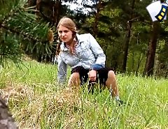 Cute lonely walker playing watersports in forest