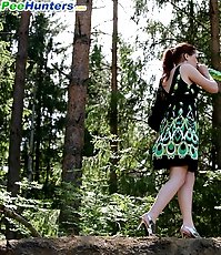 Drinking gingerhead empties her bladder outdoors