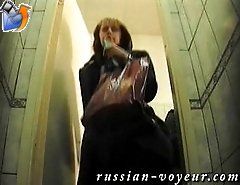 Busy girl rushes to theladies room and takes a pee spreading her hairless crack
