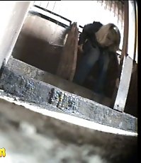 Young blonde hottie gets spycammed while pissing