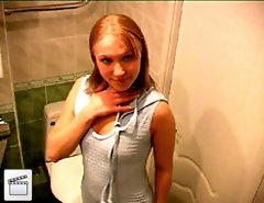 Adorable blonde cutie caught sitting on the loo