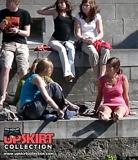 Busty chick voyeured in public. Up skirt sitting