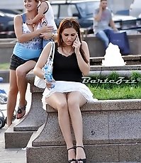 Girls pose so that upskirt were seen