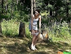 Kinky chick plays with the fountain of her piss