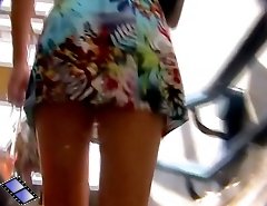 Skimpy up skirt video in a crowd