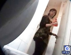 Voyeur peeps after mature and younger babe in market toilet