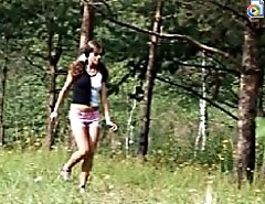 Close-up voyeur shots of a teeny pissing outdoors
