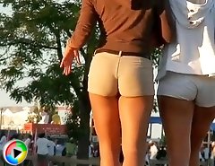 Tight shorts girls are walking in front of me deliciously waving the incredible butts