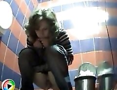 Voyeur peeps after hot babes in public toilet