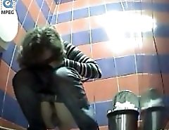 Voyeur peeps after hot babes in public toilet
