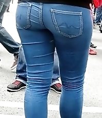 Spread legs in tight spandex jeans