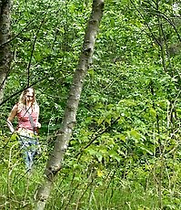 Blonde cutie empties her bladder in the forest