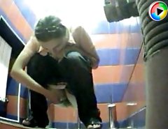 Yummy young chicks tinkle in public loo on spy cam